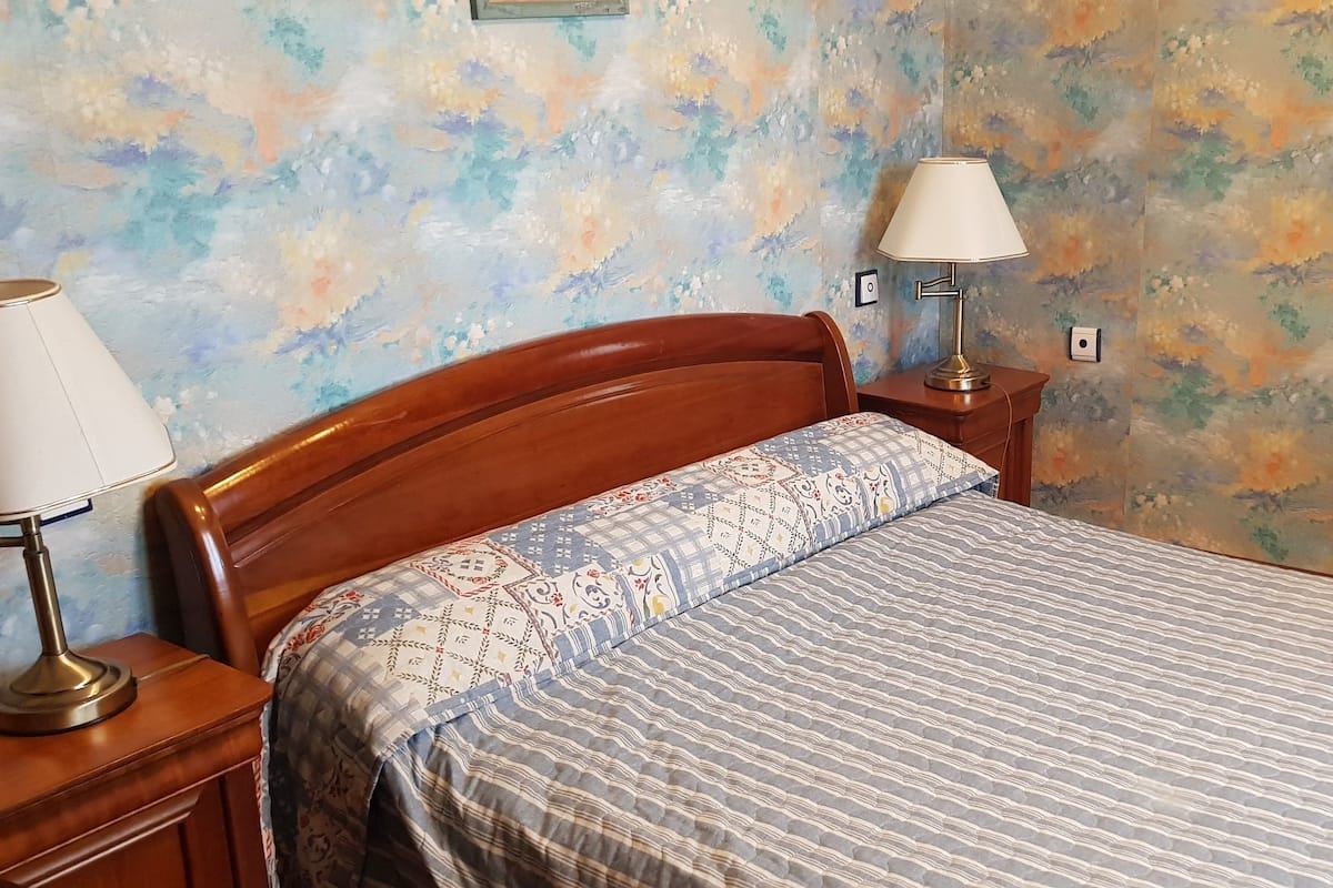Individually decorated, individually furnished, desk, rollaway beds