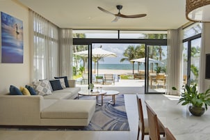 The Level 3-Bedroom Beachfront Pool Villa | Living area | LCD TV