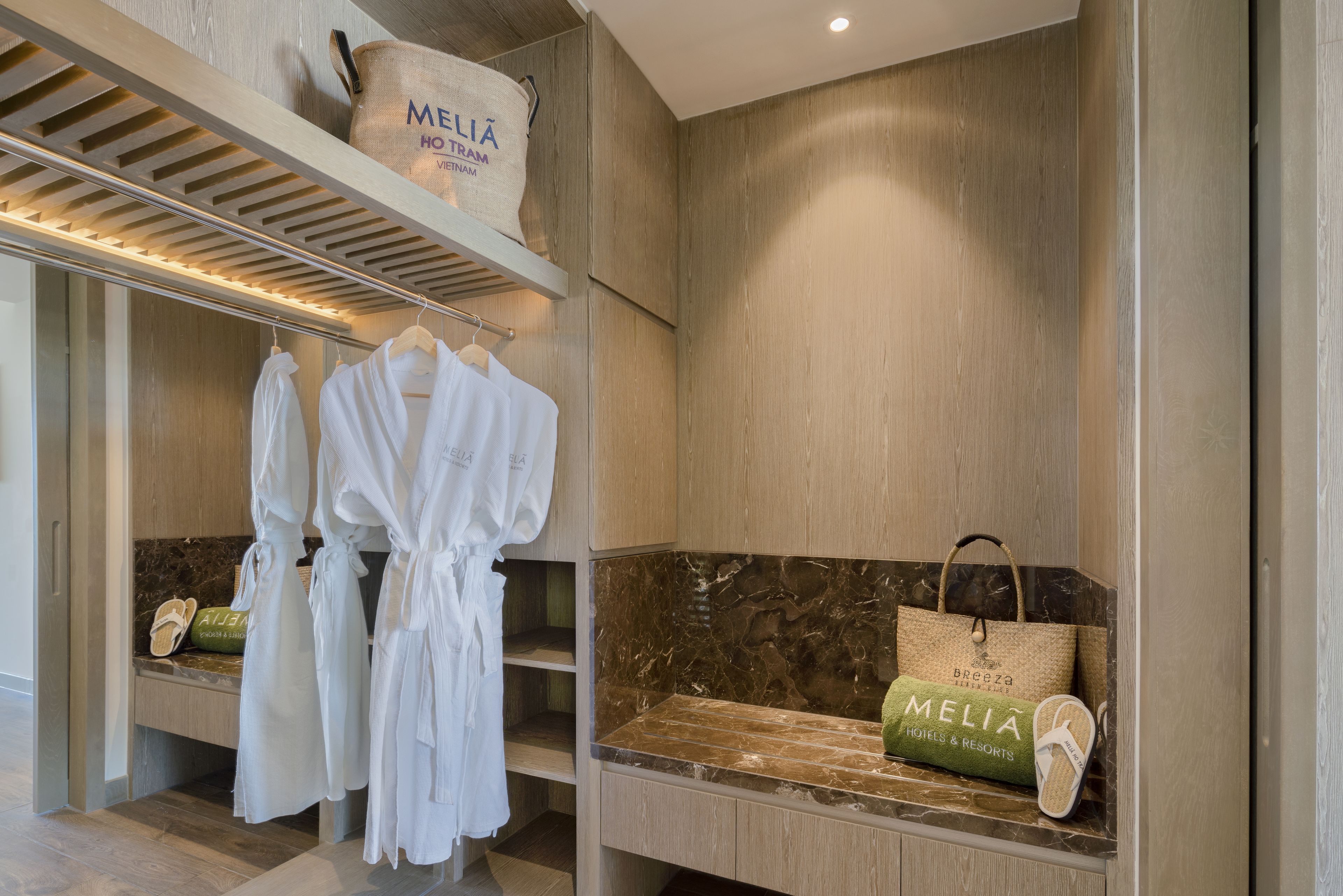 the level 4-bedroom beachfront pool villa | bathroom | eco-friendly toiletries, hair dryer, bathrobes, slippers