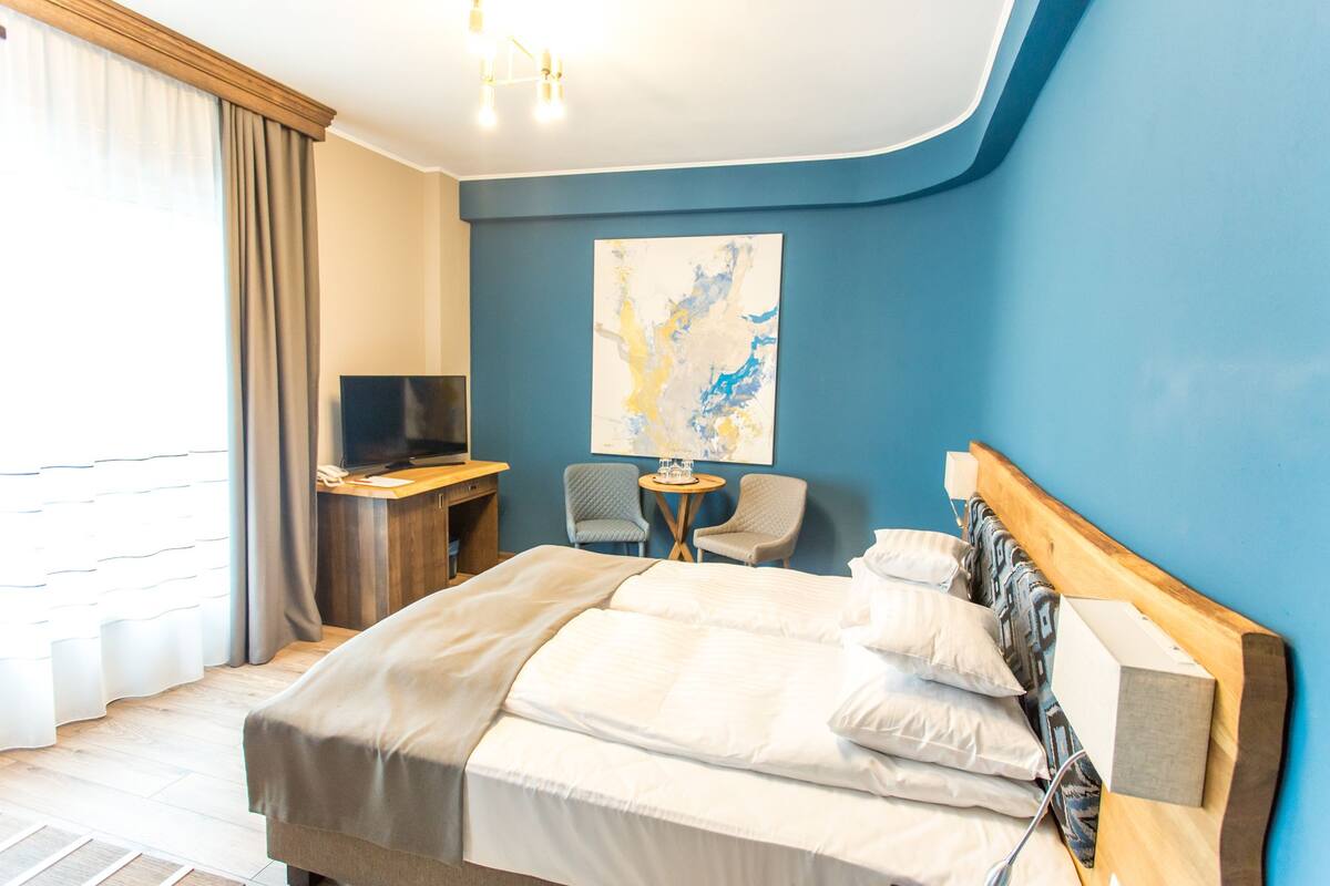 Standaard Twin kamer, 2 eenpersoonsbedden, niet-roken | 1 slaapkamer, luxe beddengoed, een kluis op de kamer, een bureau
