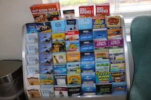A display of travel guidebooks arranged in a grid.