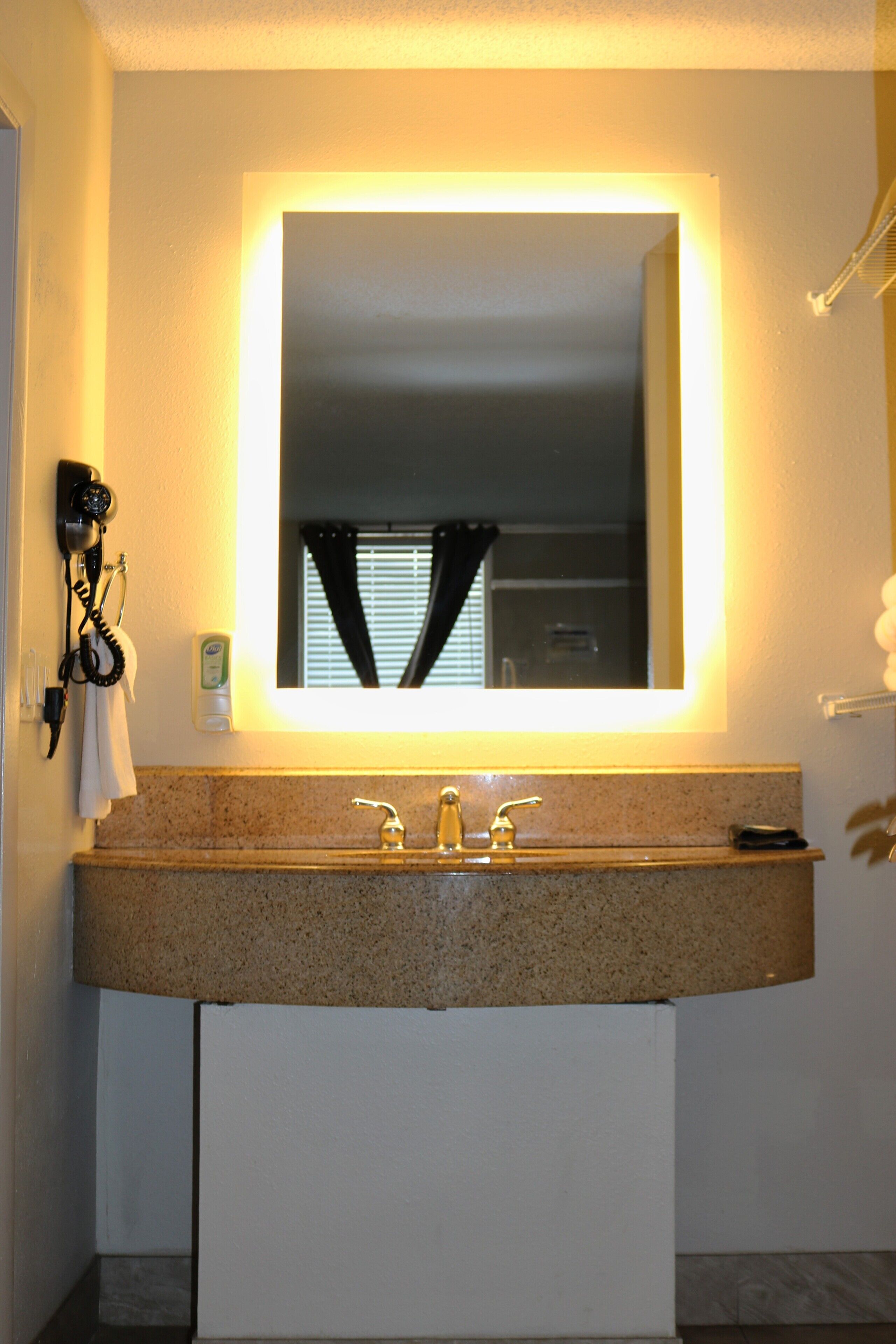 eco-friendly toiletries, hair dryer, towels, soap