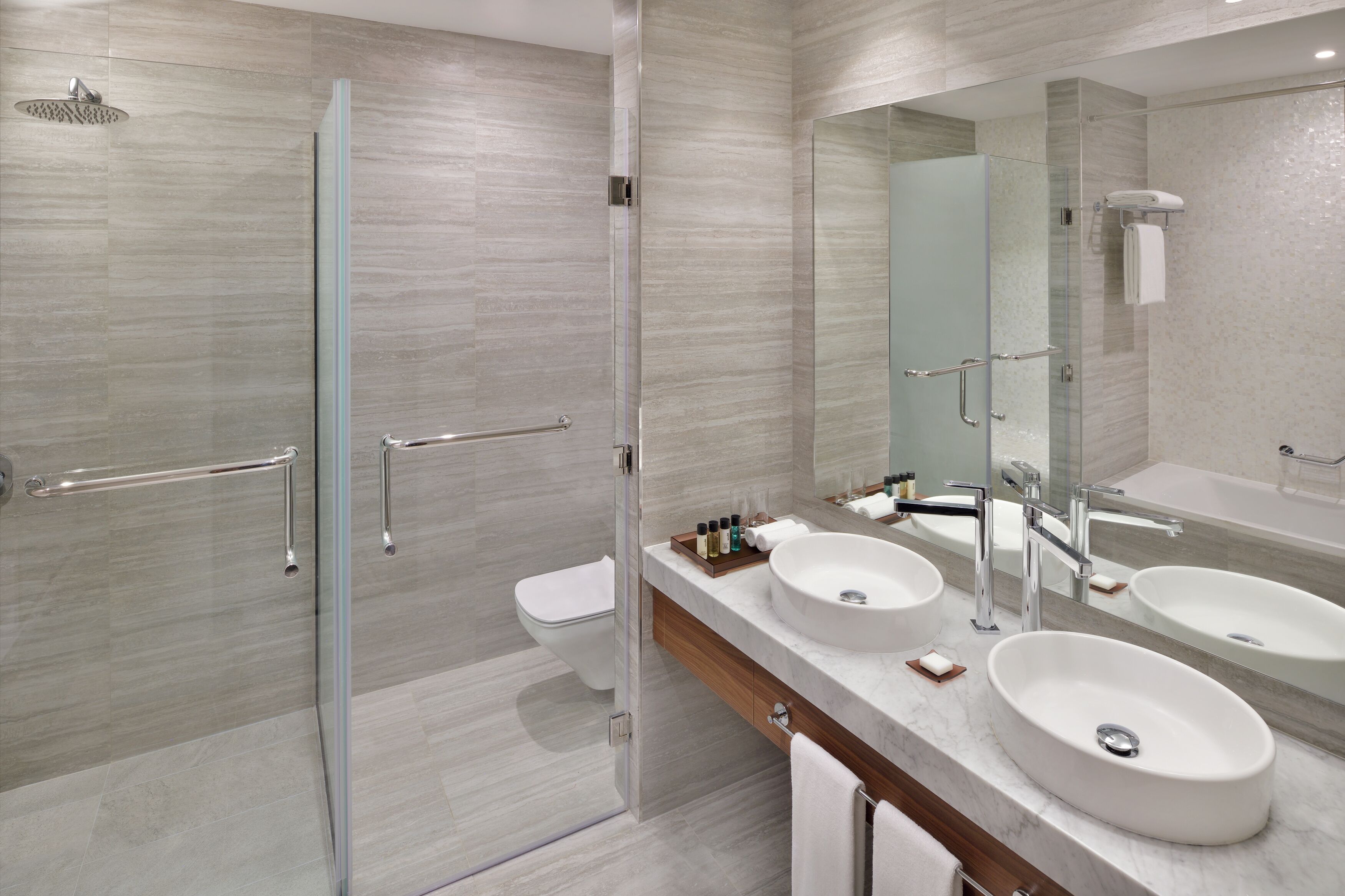 penthouse, multiple beds | bathroom | rainfall showerhead, eco-friendly toiletries, hair dryer, bathrobes