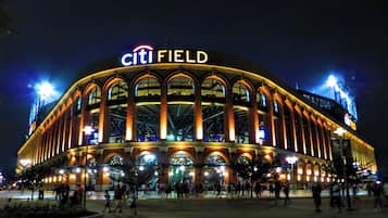 A large stadium with the name "Citi Field" illuminated at the top.