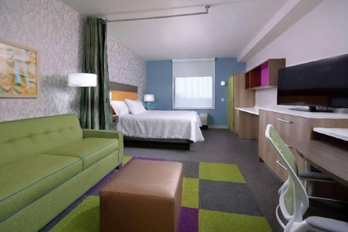 In-room safe, desk, iron/ironing board, cribs (free)