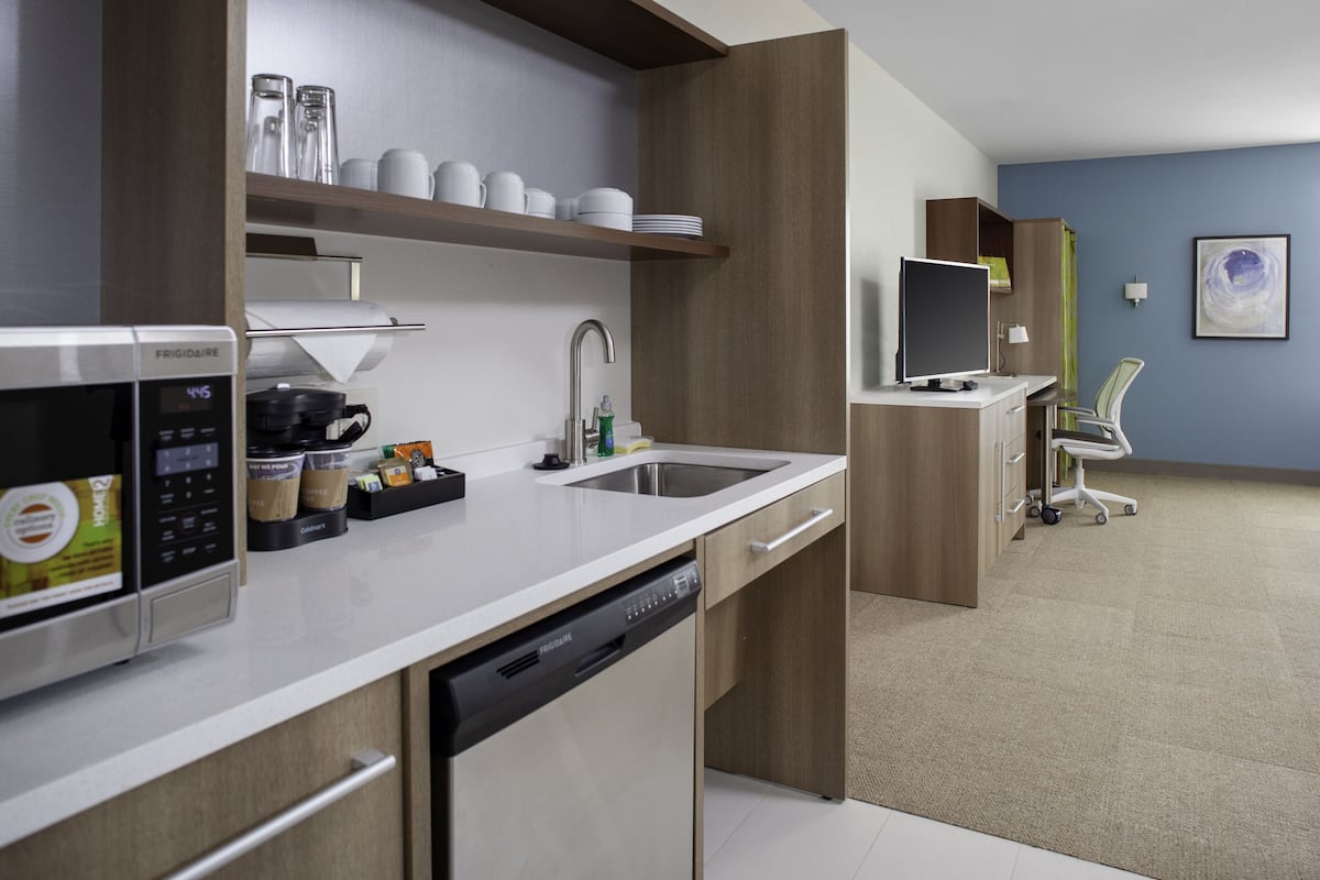 full-sized fridge, microwave, dishwasher, coffee/tea maker