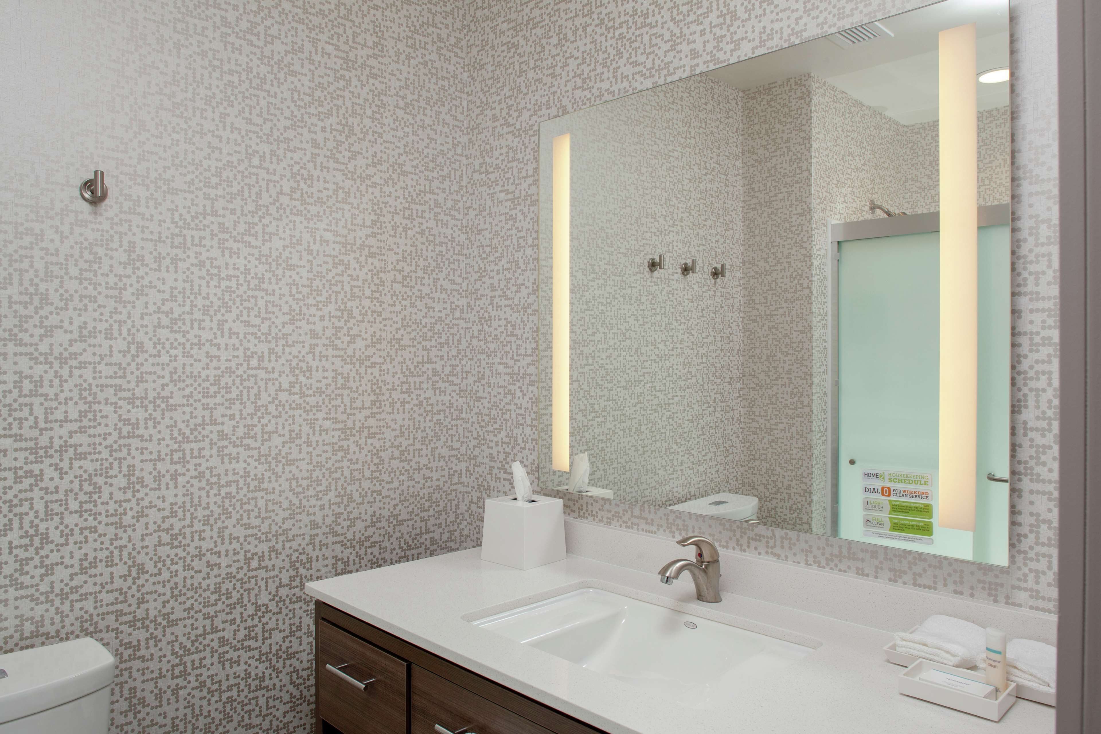 hair dryer, bathrobes, towels, soap