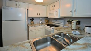 Fridge, microwave, oven, stovetop - Coastal Escape - Beachfront 2BR w/ Pools, Tennis & Free Local Attractions (St. Augustine)