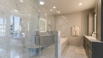 Combined shower/tub, hair dryer, towels, soap