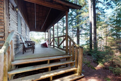 Lakefront cabin with private dock & beach access