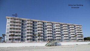 A multi-story hotel with balconies, located by the beach. - Penthouse Suite! Spacious End Corner Unit! 3Bedroom 3 Bath! New Pool 2024 (Daytona Beach)