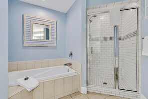 Bathtub, hair dryer, towels, soap