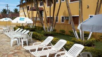 Outdoor pool, pool umbrellas, pool loungers