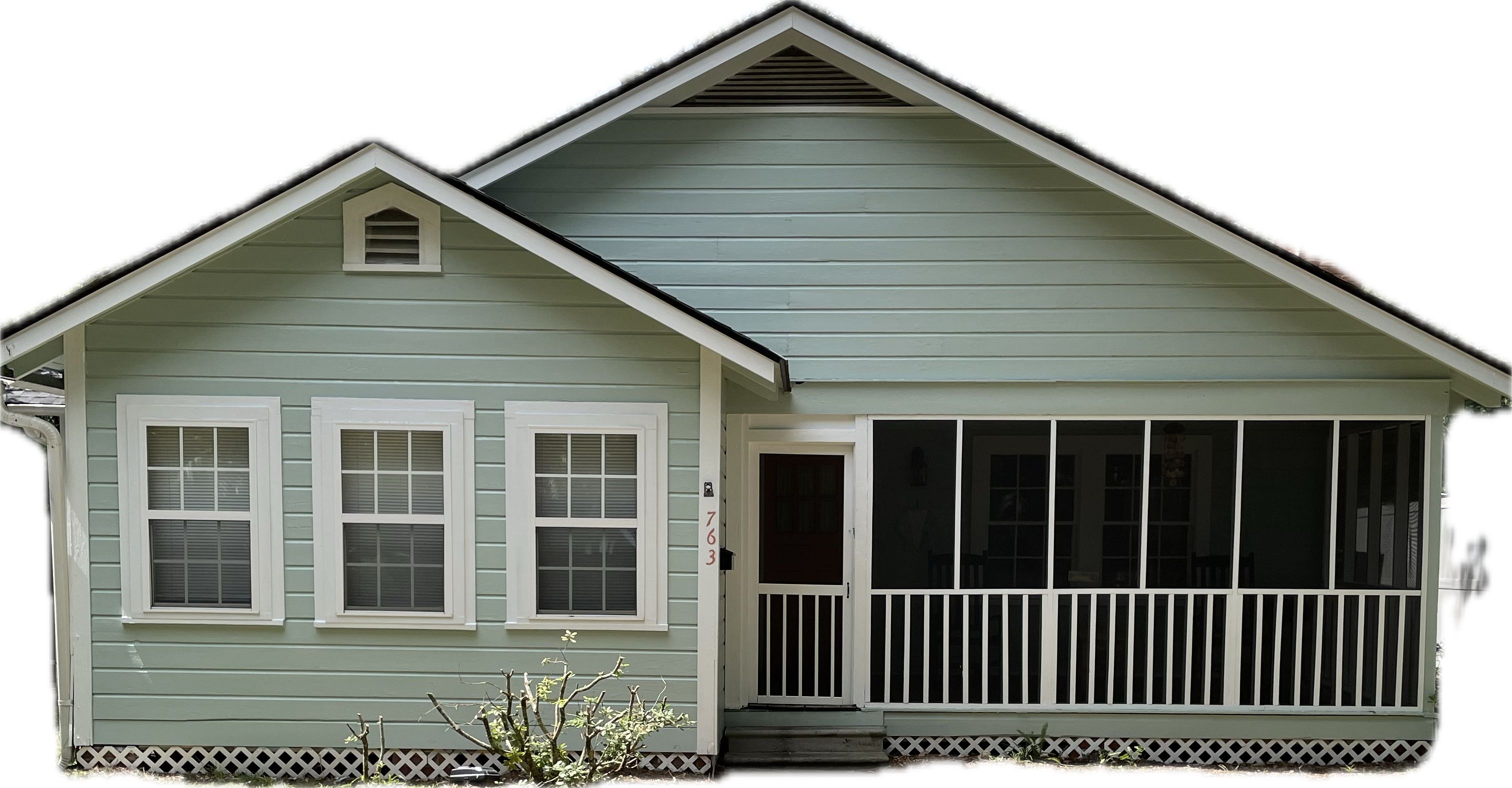 A two-story house with a gabled roof and a front porch.