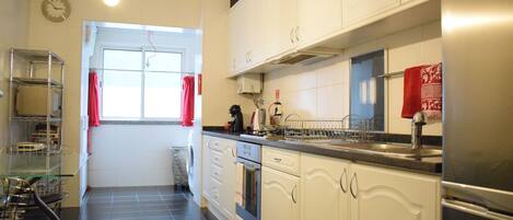 Microwave, coffee/tea maker, toaster, cookware/dishes/utensils