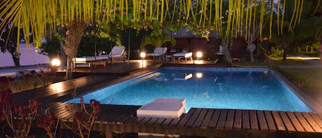 Outdoor pool, open 7 AM to 9 PM, pool loungers