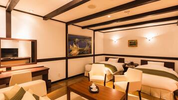 A hotel room with a wooden ceiling, a television, a painting, and two beds with white bedding.