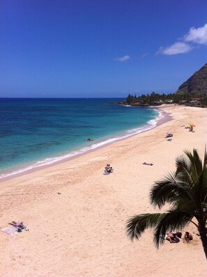 On the beach, sun loungers, beach towels