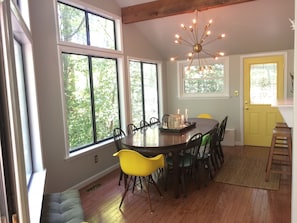 Floor to ceiling windows with view of lake while dining 