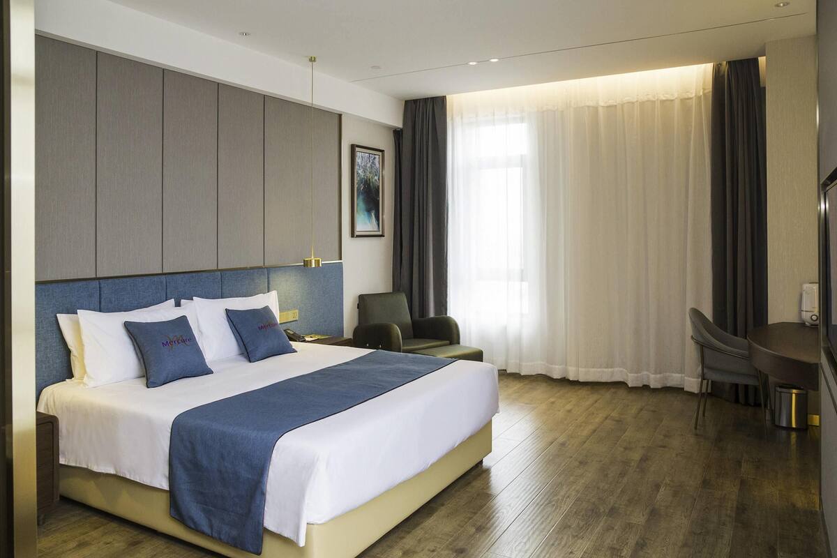 Habitación ejecutiva, 1 cama King size | 1 habitación, minibar y caja de seguridad en la habitación