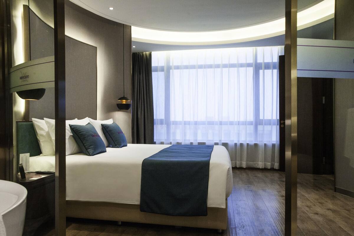 Suite Deluxe, 1 cama King size | 1 habitación, minibar y caja de seguridad en la habitación