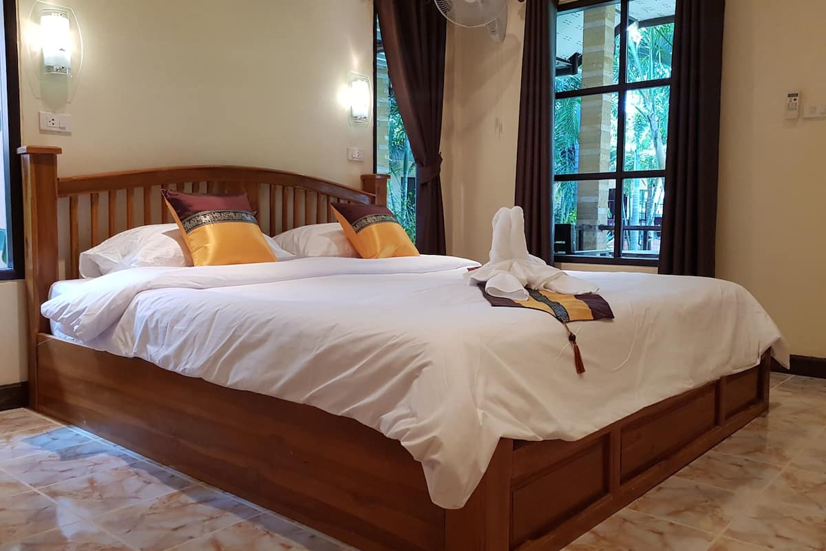 deluxe room | 1 bedroom, in-room safe, individually decorated, individually furnished