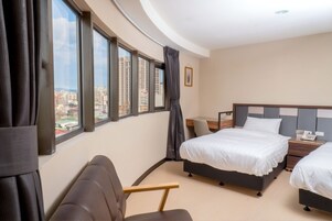 Business Double Room, City View | Down comforters, desk, laptop workspace, blackout drapes
