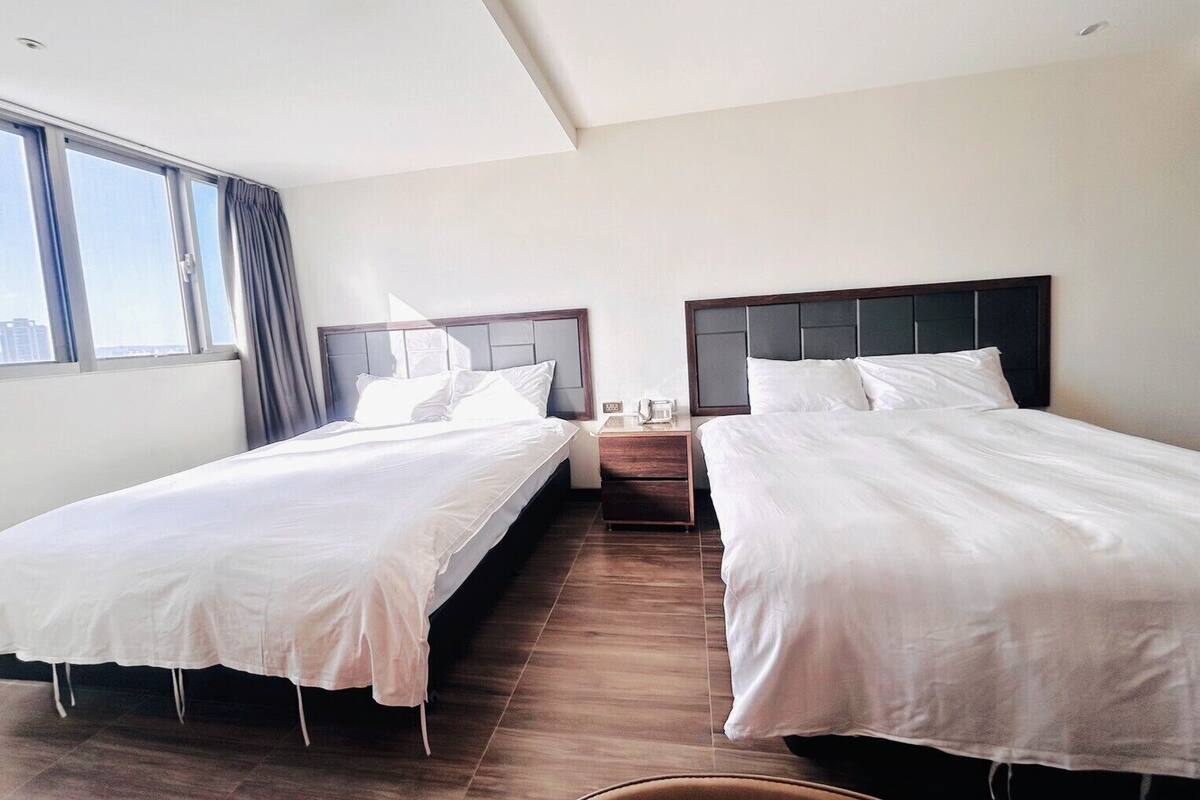 Comfort Quadruple Room | Down comforters, desk, laptop workspace, blackout drapes