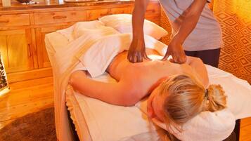 Experience a soothing massage in a serene space with a skilled therapist.