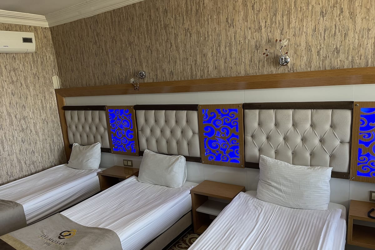 Superior Triple Room | Minibar, desk, laptop workspace, soundproofing