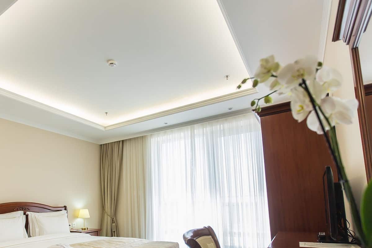Suite Affaires, terrasse | Draps en coton égyptien, literie de qualité supérieure, minibar
