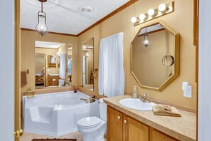 Shower, jetted tub, hair dryer, towels