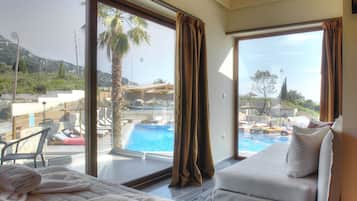 Junior Suite (River Pool Access) | In-room safe, iron/ironing board, free WiFi, bed sheets