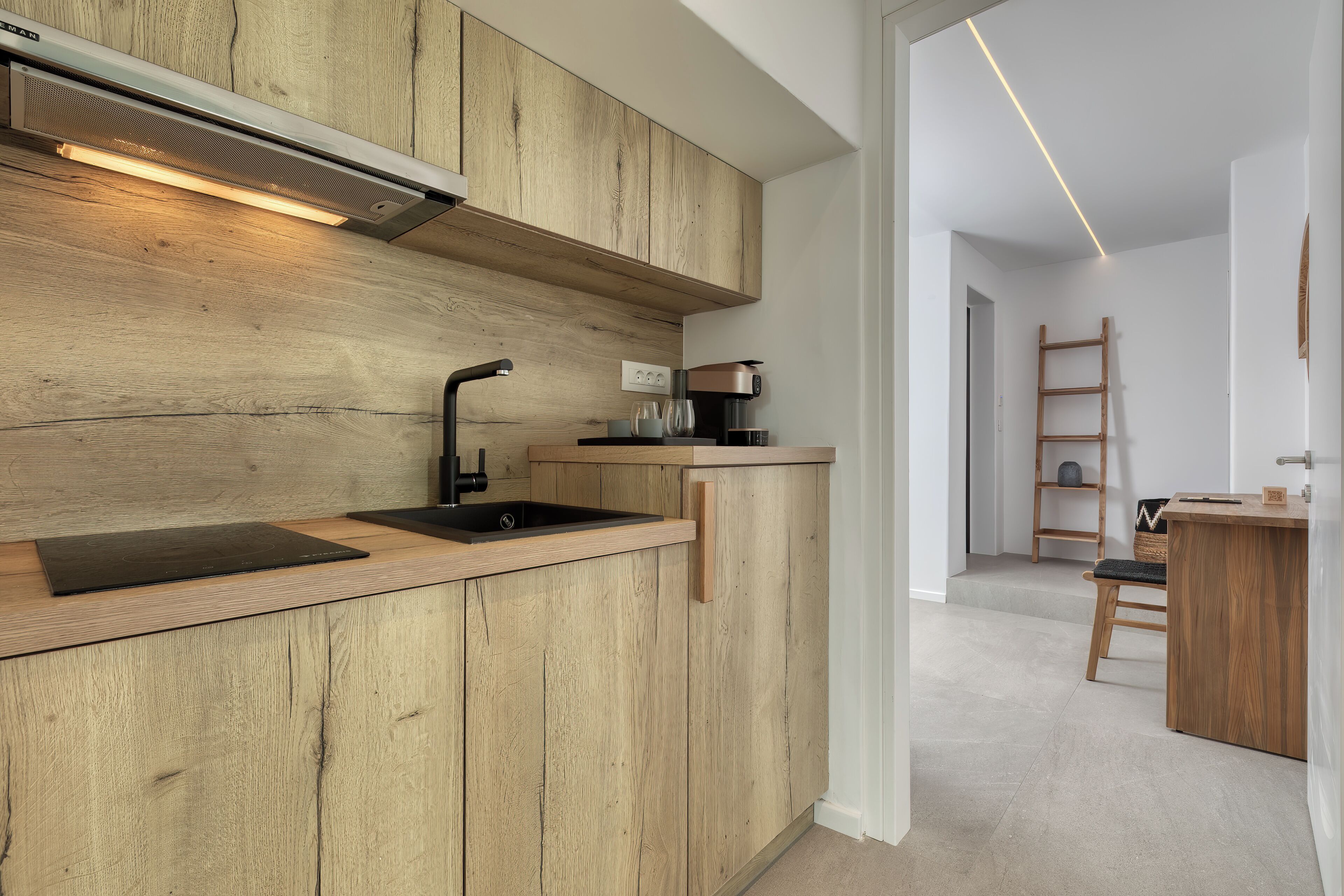 luxury apartment, 2 bedrooms, sea view, beachfront | private kitchen | fridge, electric kettle, high chair