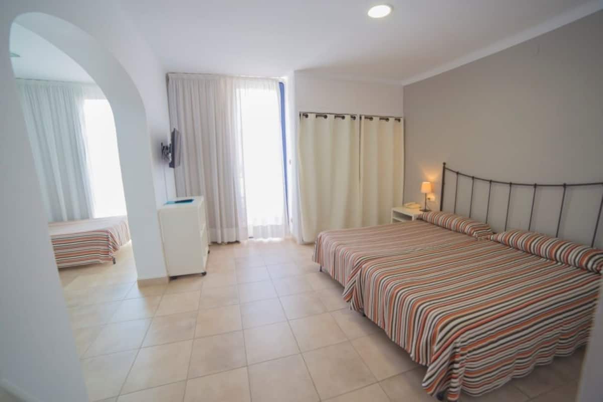Quadruple Room | Blackout drapes, iron/ironing board (on request), cribs (free)