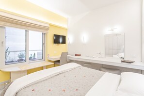 Apartment | Free minibar, in-room safe, individually decorated, desk
