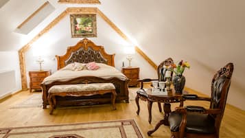 Suite, 1 letto king, non fumatori | Una scrivania, insonorizzazione, Wi-Fi gratuito, lenzuola