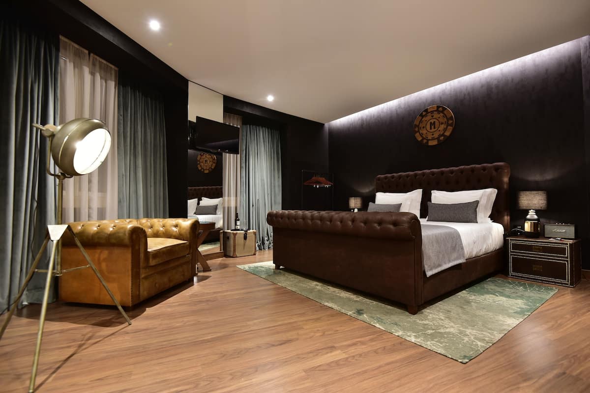 Blackout drapes, soundproofing, iron/ironing board (on request)
