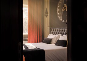 Chambre Double Deluxe | Rideaux occultants, chambres insonorisées, fer et planche à repasser