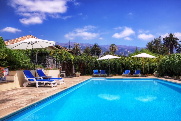 Outdoor pool, pool umbrellas, pool loungers
