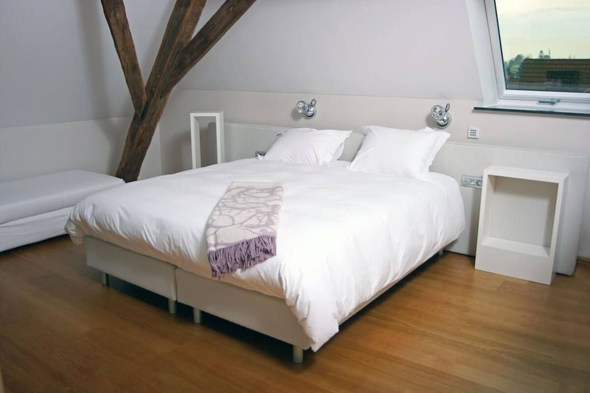 Egyptian cotton sheets, premium bedding, down duvets, minibar