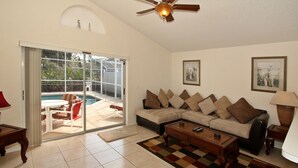 Standard Villa (3 beds) | Living area | Flat-screen TV - Kissimmee Vacation Homes (Kissimmee)