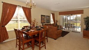 Premium Villa (4 beds) | Living area | Flat-screen TV - Kissimmee Vacation Homes (Kissimmee)