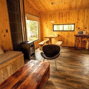 Superior Cabin, 2 Bedrooms, Non Smoking, Private Bathroom | Living area | 32-inch LED TV with satellite channels, TV, fireplace - La Escondida Pucón (Villarrica)
