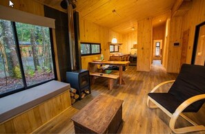 Superior Cabin, 2 Bedrooms, Non Smoking, Private Bathroom | Living area | 32-inch LED TV with satellite channels, TV, fireplace - La Escondida Pucón (Villarrica)