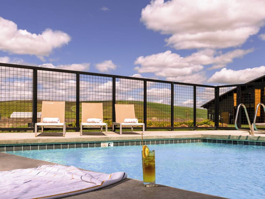Seasonal outdoor pool, pool umbrellas, sun loungers