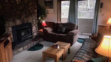 Standard Condo, 2 Bedrooms | Living room | TV, fireplace