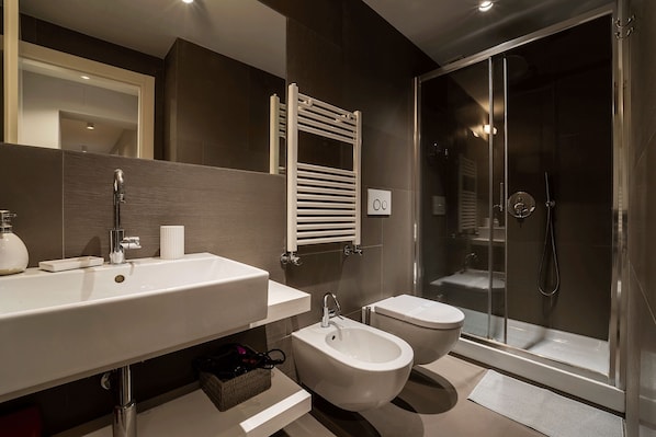 Shower, eco-friendly toiletries, hair dryer, bidet