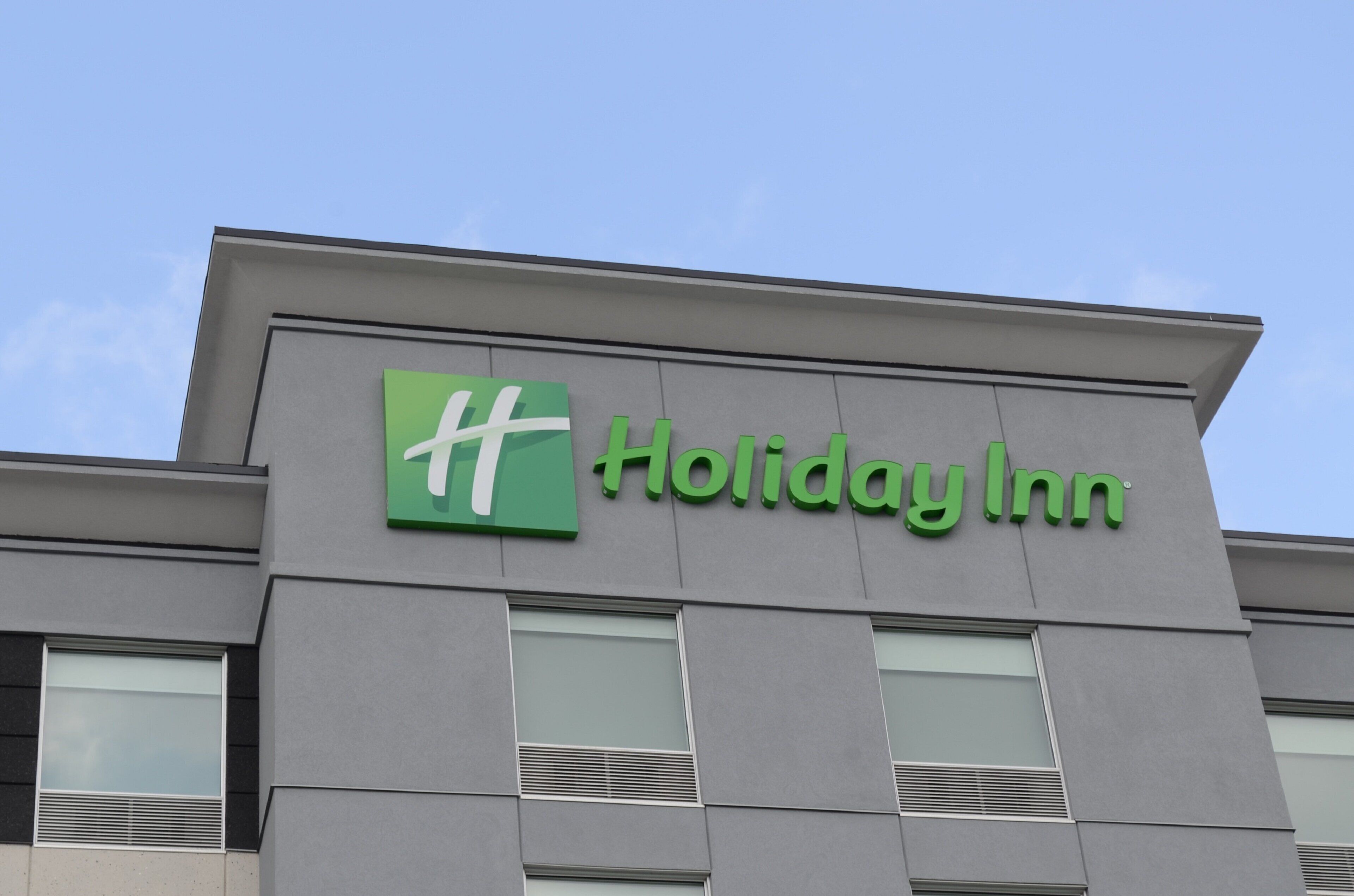 A Holiday Inn sign on a building.