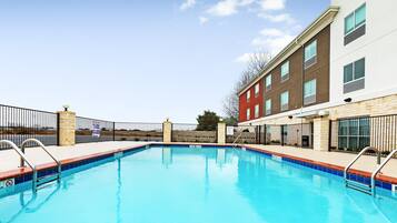 Seasonal outdoor pool, open 9:00 AM to 10:00 PM, sun loungers